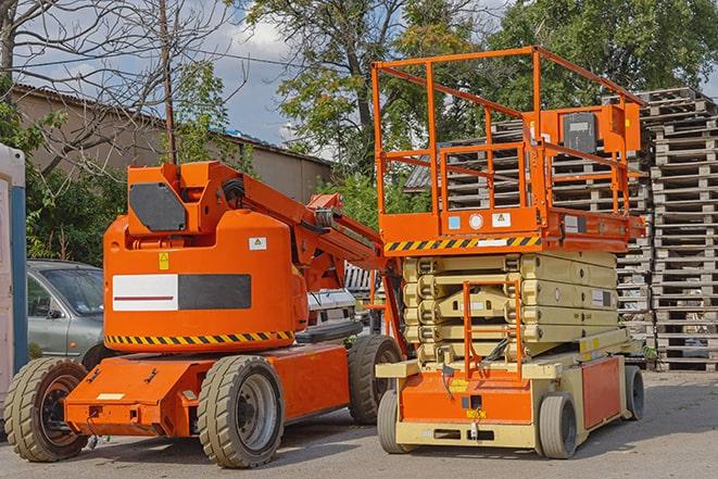 pallets being moved by forklift in a warehouse setting in Lake Helen, FL